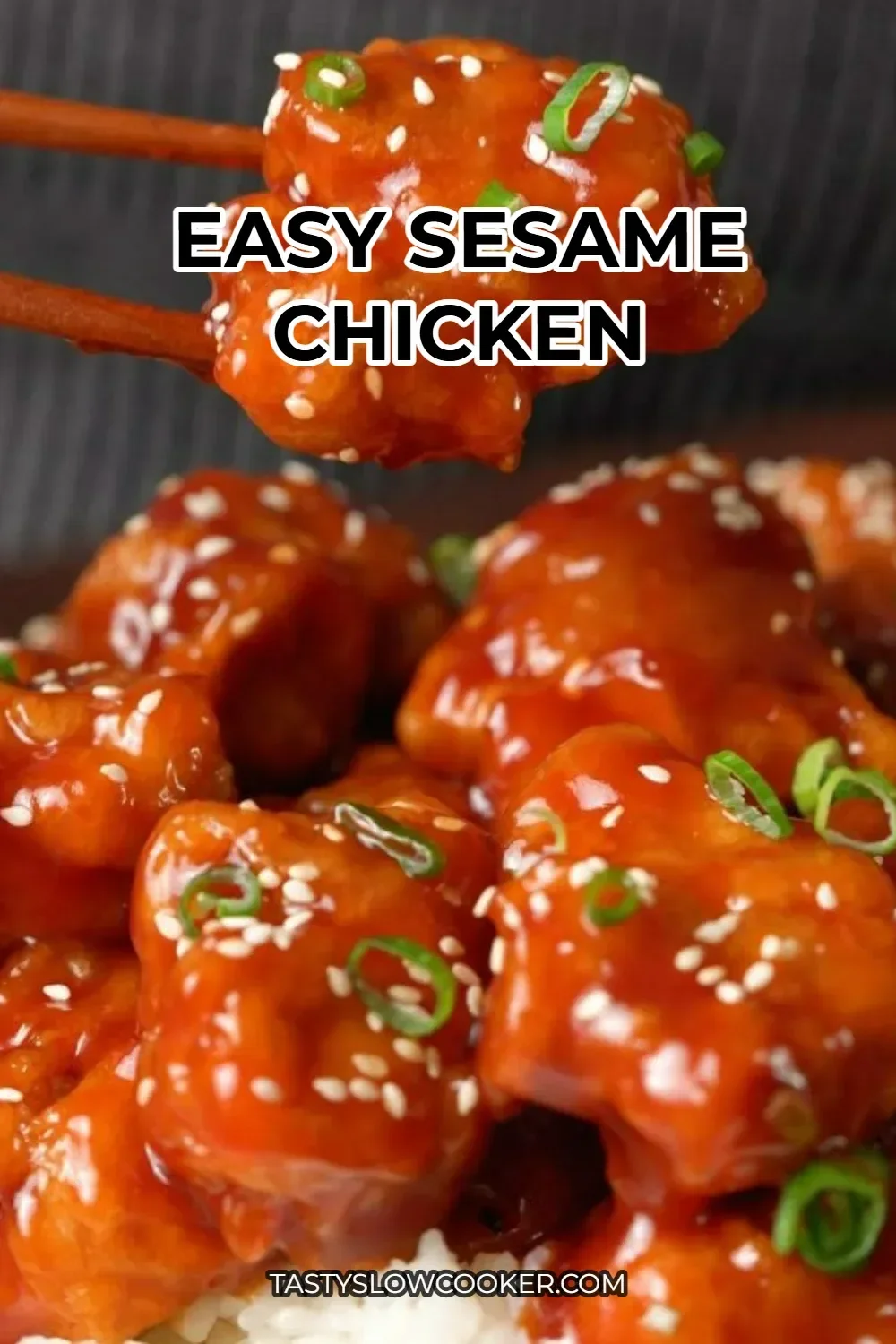 Delicious homemade easy sesame chicken served with sesame seeds and vegetables.