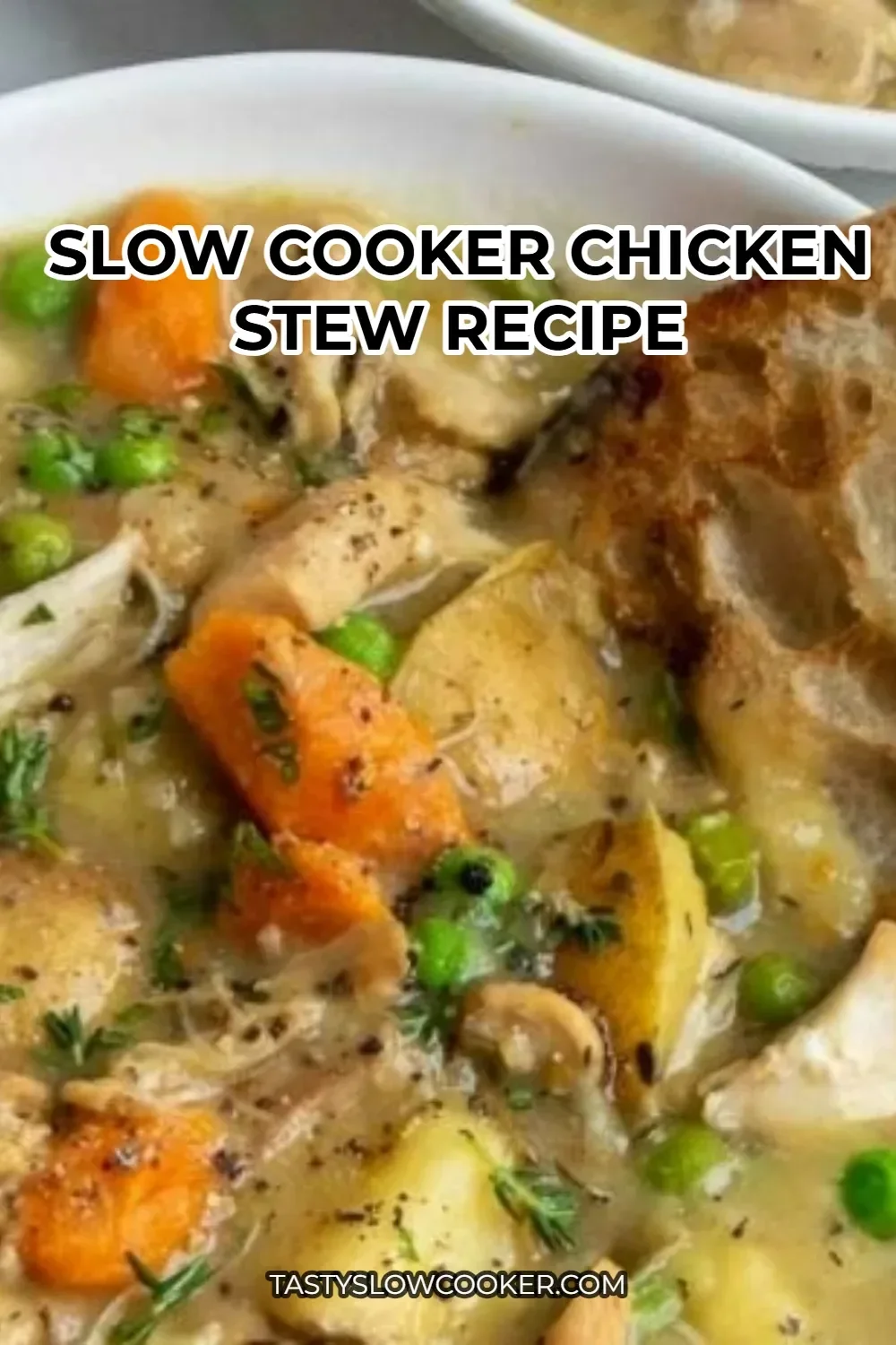 Hearty slow cooker chicken stew with vegetables and herbs in a bowl.