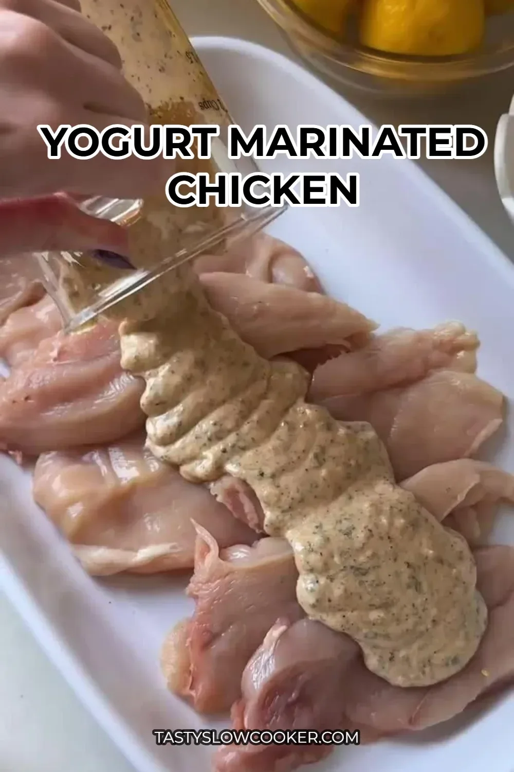 Delicious Yogurt Marinated Chicken on a plate with herbs