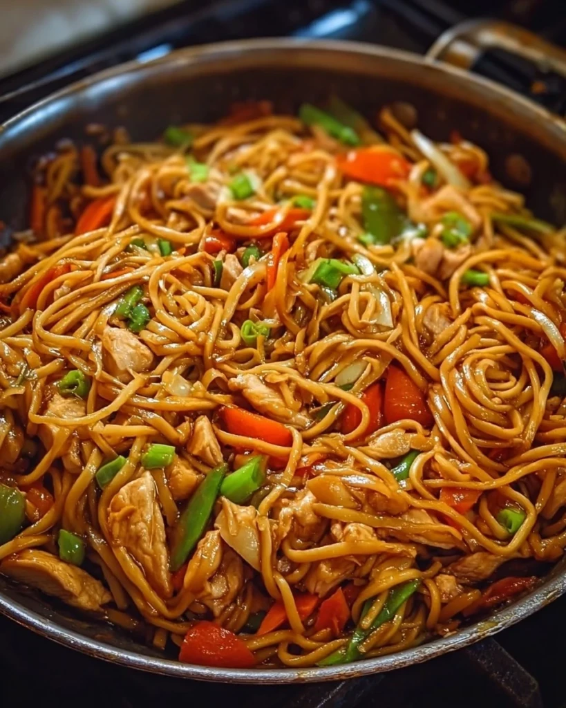 Delicious Chicken Lo Mein served in a bowl with colorful vegetables