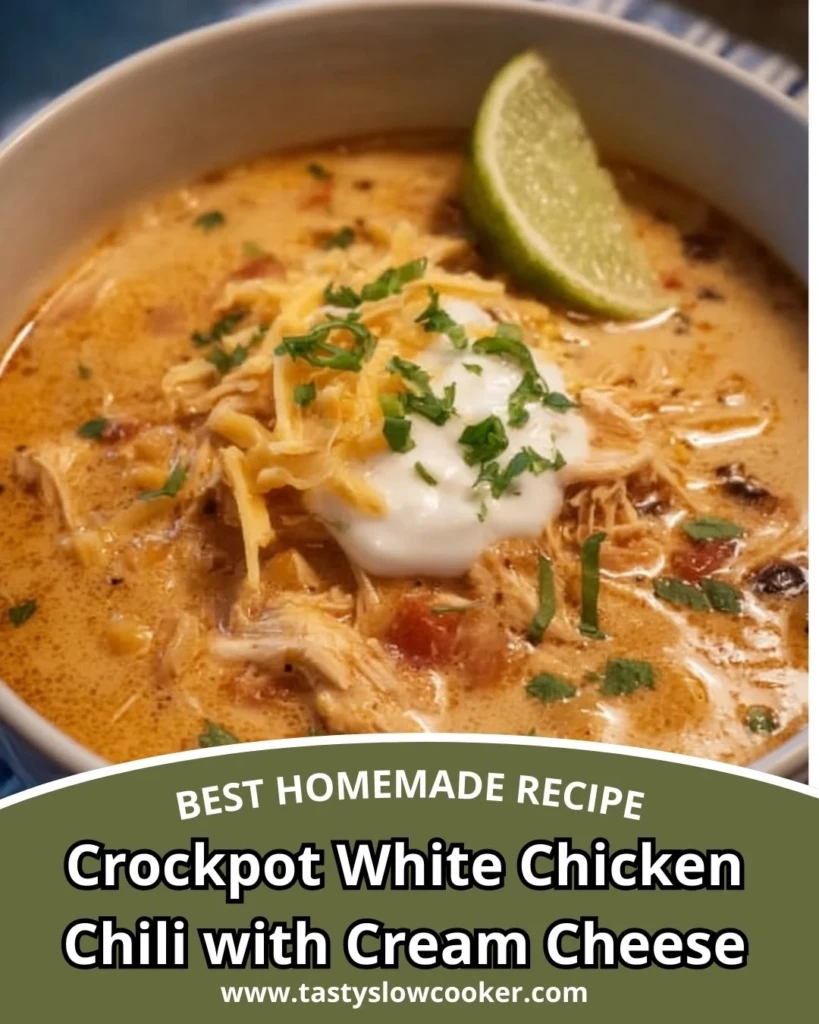 Crockpot white chicken chili with cream cheese garnished with herbs