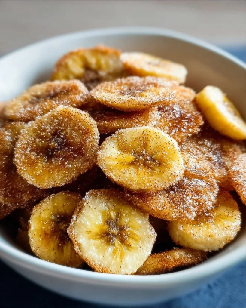 Cinnamon-sugar air fryer banana chips served in a bowl