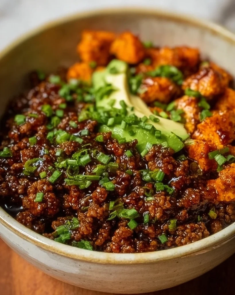 Ground Beef Hot Honey Bowl with colorful vegetables and sauce