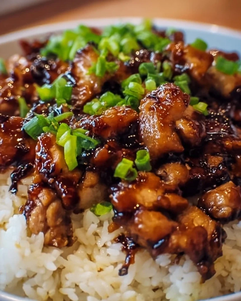 Honey BBQ Chicken served over rice with a drizzle of sauce