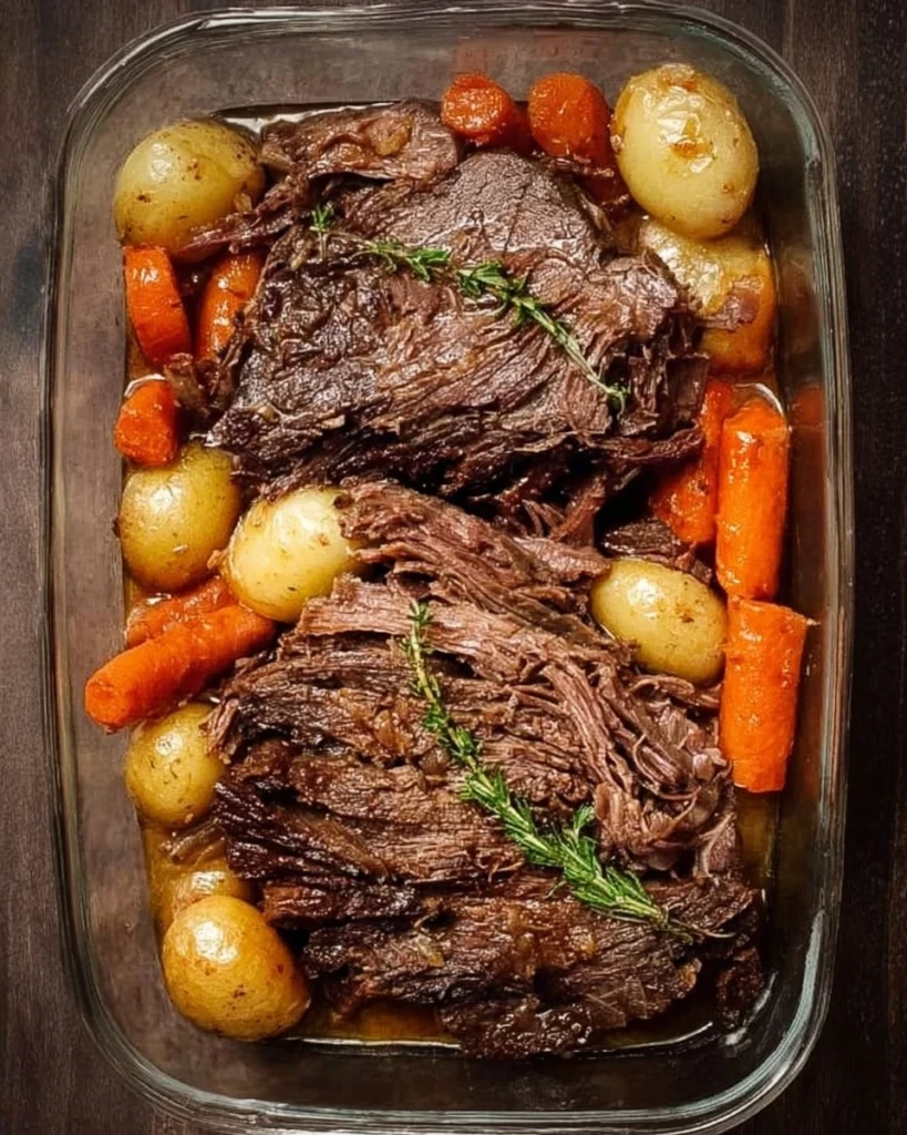 Delicious tender pot roast served with vegetables and gravy