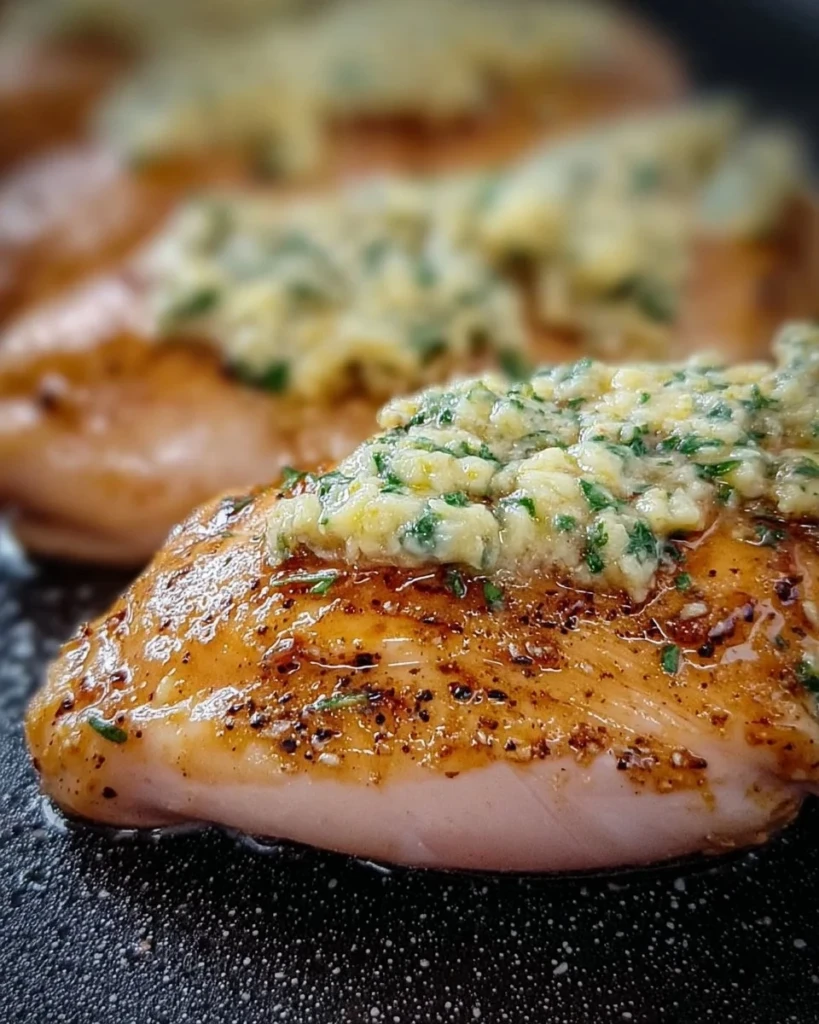 Juicy Melt In Your Mouth Chicken Breast served with herbs and spices